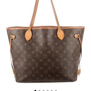 Louis Vuitton bag, leather, over the shoulder, straps. comes with us bag.